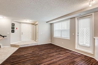 Photo 1: 106 6600 Old Banff Coach Road SW in Calgary: Patterson Apartment for sale : MLS®# A1171957