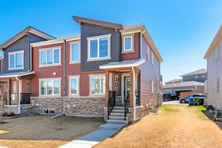 Photo 2: 1215 140 Avenue NW in Calgary: Carrington Row/Townhouse for sale : MLS®# A2043557