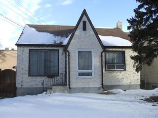 Photo 1: 875 Arlington Street in Winnipeg: West End Residential for sale (5A)  : MLS®# 202100702