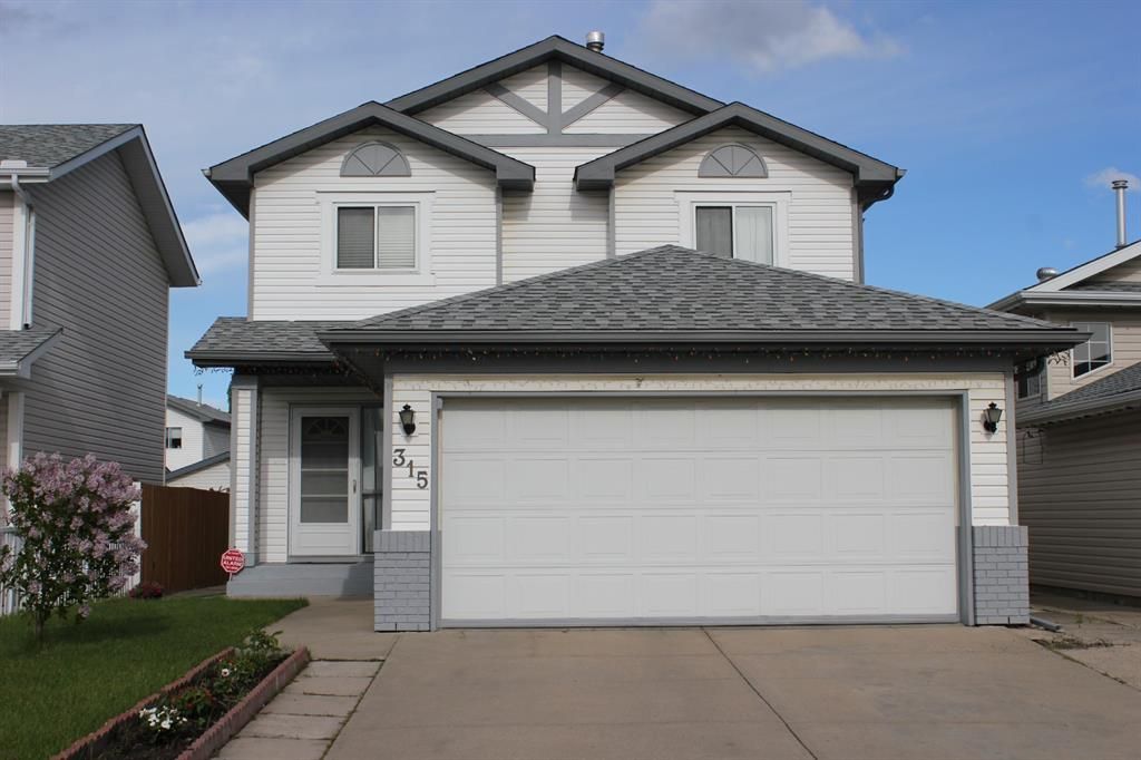 Main Photo: 315 Applewood Drive SE in Calgary: Applewood Park Detached for sale : MLS®# A1233805