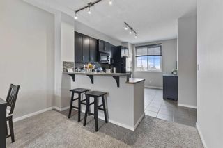 Photo 10: 92 Evansview Gardens NW in Calgary: Evanston Row/Townhouse for sale : MLS®# A2128589