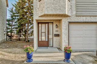 Photo 2: 148 Glamis Terrace SW in Calgary: Glamorgan Row/Townhouse for sale : MLS®# A2044336
