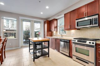 Photo 1: 324 E 14TH Street in North Vancouver: Central Lonsdale Townhouse for sale in "Avondale" : MLS®# R2868621