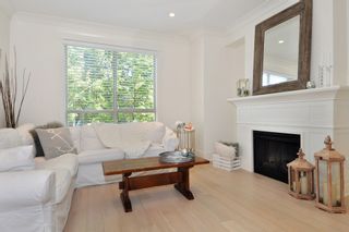 Photo 2: 37 100 KLAHANIE Drive in Port Moody: Port Moody Centre Townhouse for sale in "INDIGO" : MLS®# R2303018