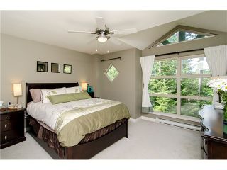 Photo 1: 29 65 FOXWOOD Drive in Port Moody: Heritage Mountain Townhouse for sale in "FOREST HILL" : MLS®# V974038
