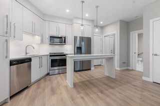 Photo 15: 119 383 Smith Street NW in Calgary: University District Apartment for sale : MLS®# A2104264