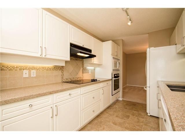 Photo 5: Photos: 403 3670 BANFF Court in North Vancouver: Northlands Condo for sale in "PARKGATE MANOR" : MLS®# V1065587