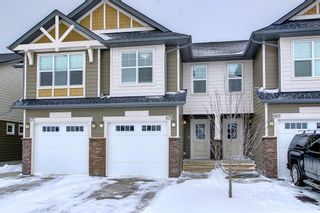 Photo 1: 671 101 Sunset Drive: Cochrane Row/Townhouse for sale : MLS®# A2010546