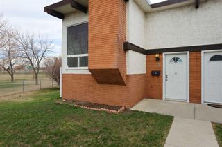 Photo 2: 241 Pinemont Road NE in Calgary: Pineridge Semi Detached (Half Duplex) for sale : MLS®# A2122804