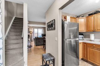 Photo 3: 84 2511 38 Street NE in Calgary: Rundle Row/Townhouse for sale : MLS®# A2072497