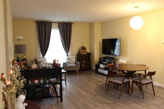 Photo 3: 101 117 19 Avenue NE in Calgary: Tuxedo Park Apartment for sale : MLS®# A2128958