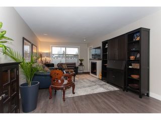 Photo 3: 202 19936 56 Avenue in Langley: Langley City Condo for sale in "BEARING POINTE" : MLS®# R2240895