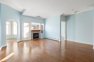 Photo 4: 319 248 Sunterra Ridge Place: Cochrane Apartment for sale : MLS®# A2004149