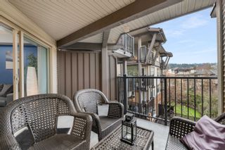 Photo 16: 311 400 KLAHANIE Drive in Port Moody: Port Moody Centre Condo for sale in "TIDES" : MLS®# R2748551