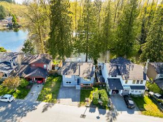 Photo 1: 1231 RIVER Drive in Coquitlam: River Springs House for sale in "RIVER SPRINGS" : MLS®# R2781260