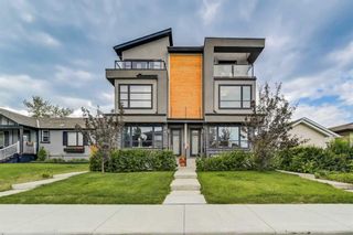 Photo 1: 1 411 25 Avenue NE in Calgary: Winston Heights/Mountview Row/Townhouse for sale : MLS®# A2065760