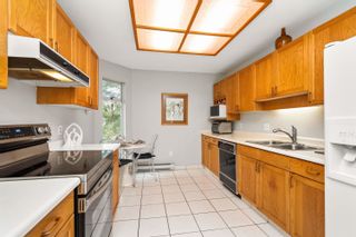 Photo 5: 403 2733 ATLIN Place in Coquitlam: Coquitlam East Condo for sale in "Atlin Court" : MLS®# R2866834