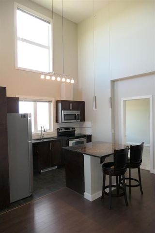 Photo 11: 2432 604 East Lake Boulevard NE: Airdrie Apartment for sale : MLS®# A1219151