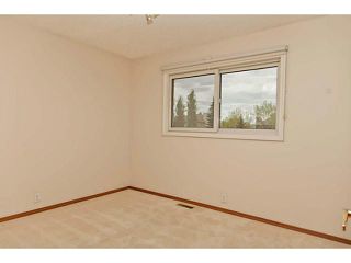 Photo 14: 335 WOODPARK Court SW in CALGARY: Woodlands Residential Detached Single Family for sale (Calgary)  : MLS®# C3572330