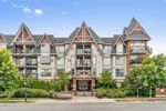 Main Photo: 413 17769 57 Avenue in Surrey: Cloverdale BC Condo for sale in "Clover Downs Estates" (Cloverdale)  : MLS®# R2881996