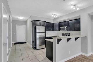 Photo 7: 106 117 19 Avenue NE in Calgary: Tuxedo Park Apartment for sale : MLS®# A2118272