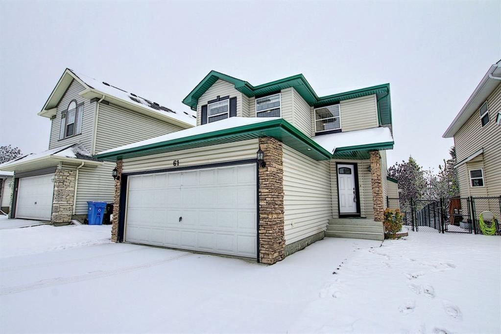 Main Photo: 61 Rocky Ridge Green NW in Calgary: Rocky Ridge Detached for sale : MLS®# A1043597