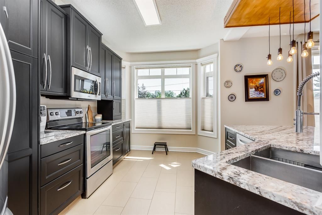 Photo 4: Photos: 201 910 70 Avenue SW in Calgary: Kelvin Grove Apartment for sale : MLS®# A1009409