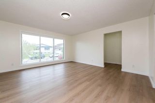 Photo 3: 107 Dovertree Place SE in Calgary: Dover Semi Detached (Half Duplex) for sale : MLS®# A2131844