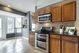 Photo 9: 65 Sun Harbour Way SE in Calgary: Sundance Detached for sale : MLS®# A1251583