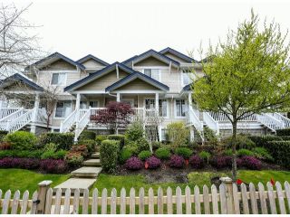 Photo 1: 8 6533 121 Street in Surrey: West Newton Townhouse for sale in "StoneBriar" : MLS®# F1310945
