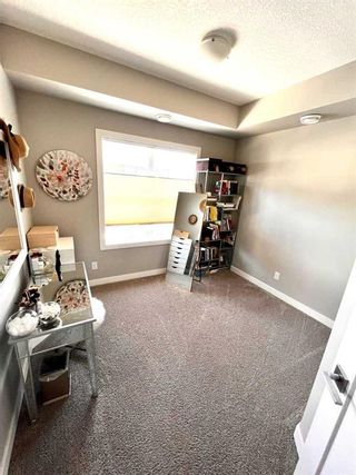 Photo 11: 123 Evanscrest Gardens NW in Calgary: Evanston Row/Townhouse for sale : MLS®# A2130147