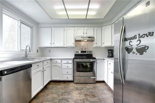 Photo 2:  in Calgary: Glamorgan Row/Townhouse for sale : MLS®# A1077235