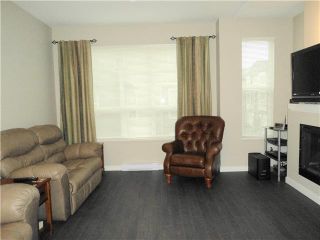 Photo 3: 98 7938 209TH Street in Langley: Willoughby Heights Townhouse for sale in "Red Maple Park" : MLS®# F1400352