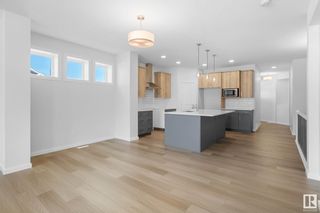 Photo 1: 22006 81A Avenue in Edmonton: Zone 58 House Half Duplex for sale : MLS®# E4353446