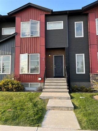 Photo 1: 238 Red Embers Way NE in Calgary: Redstone Row/Townhouse for sale : MLS®# A1257212