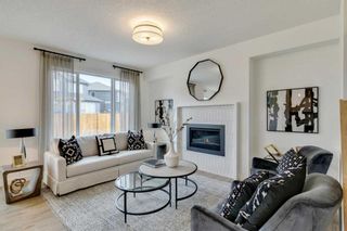 Photo 11: 67 Versant View SW in Calgary: C-163 Detached for sale : MLS®# A2122597