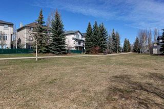 Photo 29: 48 Crystal Shores Cove: Okotoks Row/Townhouse for sale : MLS®# A2123368