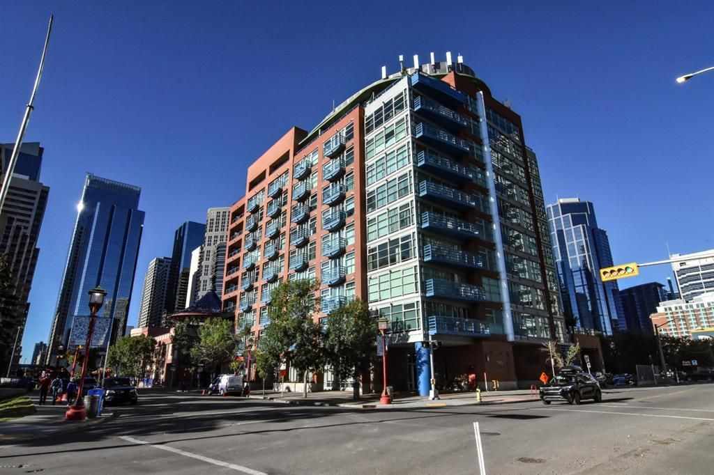 Main Photo: 201 205 Riverfront Avenue SW in Calgary: Chinatown Apartment for sale : MLS®# A2030263