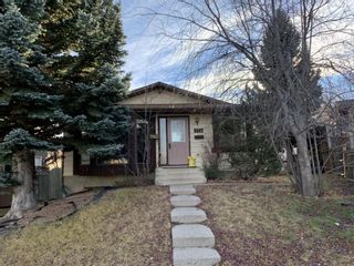 Photo 1: 124 Strathcona Close SW Calgary Home For Sale