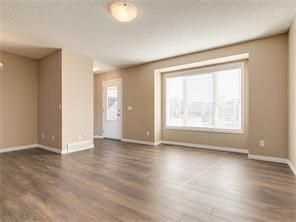 Photo 8: 4052 Windsong Boulevard SW in Airdrie: windsong House for sale : MLS®# C4120616