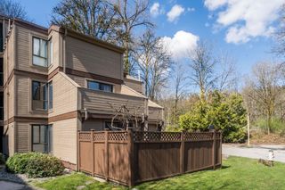 Photo 1: 204 9146 SATURNA Drive in Burnaby: Simon Fraser Hills Townhouse for sale in "Mountain Wood" (Burnaby North)  : MLS®# R2767173