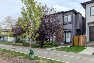Main Photo: 2018 37 Street SW in Calgary: Killarney/Glengarry Semi Detached (Half Duplex) for sale : MLS®# A2083524