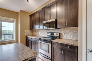Photo 10: 320 Rainbow Falls Drive: Chestermere Row/Townhouse for sale : MLS®# A1114786