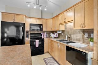 Photo 9: 505 8000 Wentworth Drive SW in Calgary: West Springs Row/Townhouse for sale : MLS®# A2020670