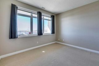 Photo 18: 19 133 Rockyledge View NW in Calgary: Rocky Ridge Row/Townhouse for sale : MLS®# A2118493