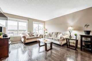 Photo 5: 44 Autumn Court SE in Calgary: Auburn Bay Detached for sale : MLS®# A1213009