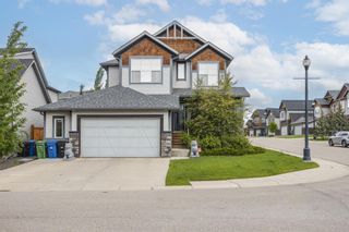 Photo 1: 287 Tremblant Way SW in Calgary: Springbank Hill Detached for sale : MLS®# A1227068