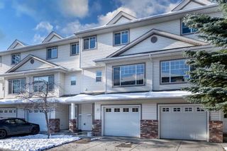 Photo 1: 83 Country Hills Cove NW in Calgary: Country Hills Row/Townhouse for sale : MLS®# A2090373
