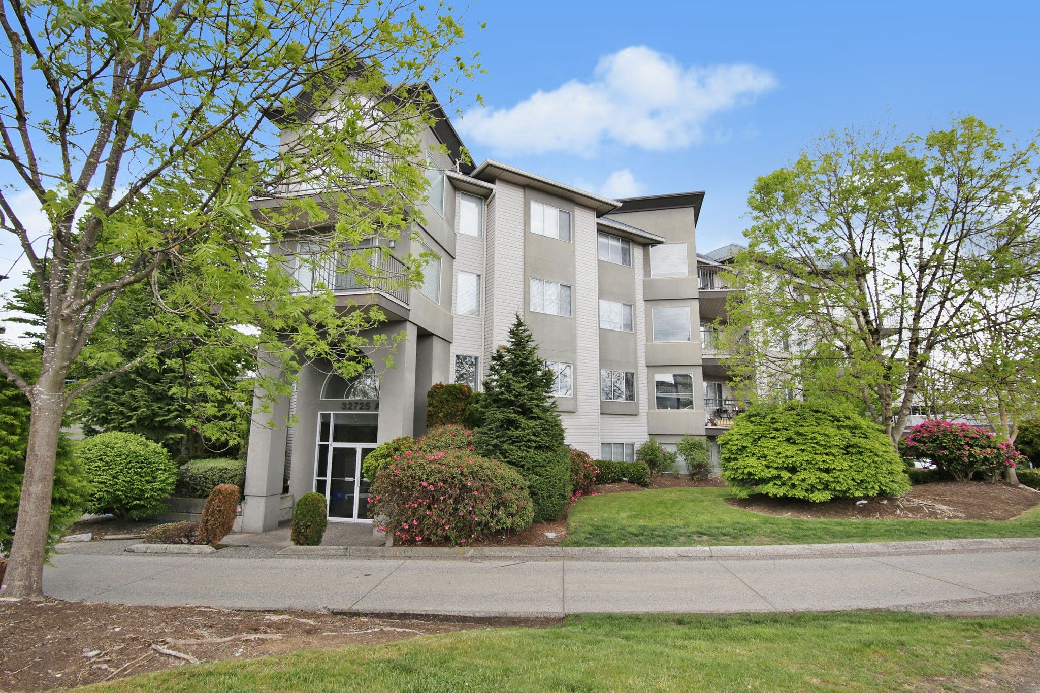 Main Photo: 303 32725 GEORGE FERGUSON Way in Abbotsford: Abbotsford West Condo for sale in "THE UPTOWN" : MLS®# R2578786