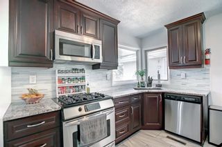 Photo 5: 3210 14 Street NW in Calgary: Rosemont Semi Detached for sale : MLS®# A1227625